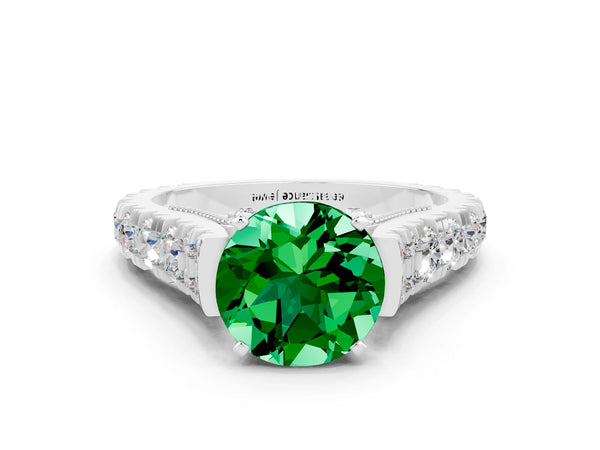 White gold Round Cut Emerald Classic Solitaire Ring with Pavé Band and Four-Prong Setting
