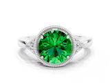 White gold Round Cut Emerald Halo Ring with Tapered Band and Four-Prong Setting