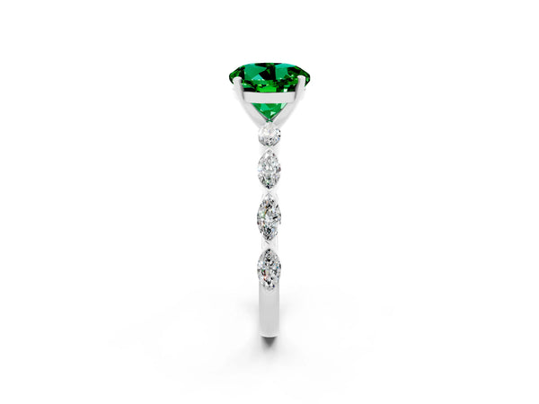 Platinum Round Cut Emerald Ring with Marquise Side Stones and Prong Setting