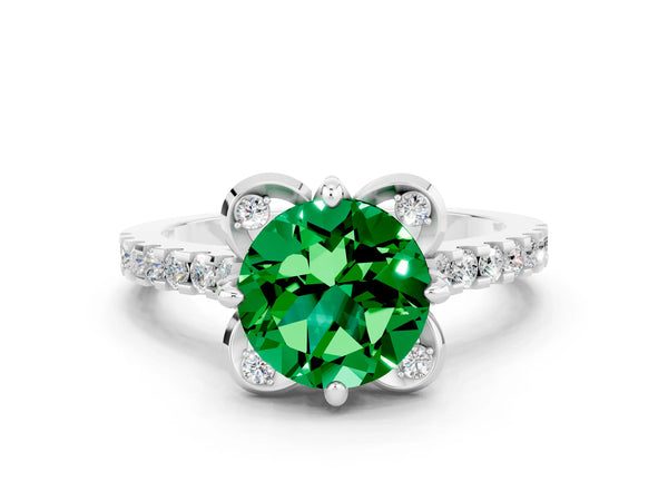 Platinum Round Cut Emerald Ring with Pavé Band and Floral Prong Setting