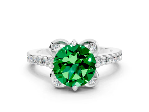 White gold Round Cut Emerald Ring with Pavé Band and Floral Prong Setting