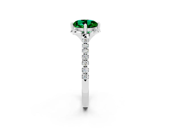Platinum Round Cut Emerald Ring with Pavé Band and Floral Prong Setting
