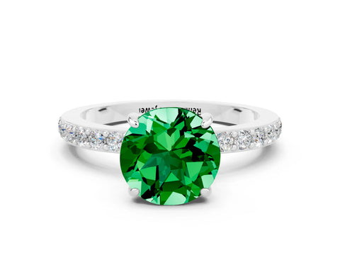 White gold Round Cut Emerald Ring with Pavé Band and Four-Prong Setting