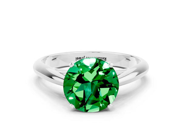 Silver Round Cut Emerald Solitaire Engagement Ring with Cathedral Setting and Four-Prong Mount