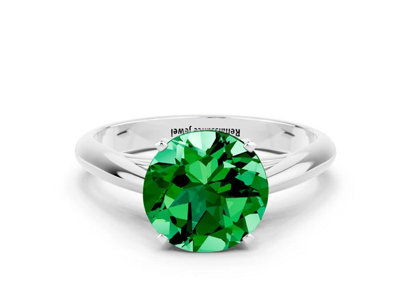 White gold Round Cut Emerald Solitaire Engagement Ring with Cathedral Setting and Four-Prong Mount
