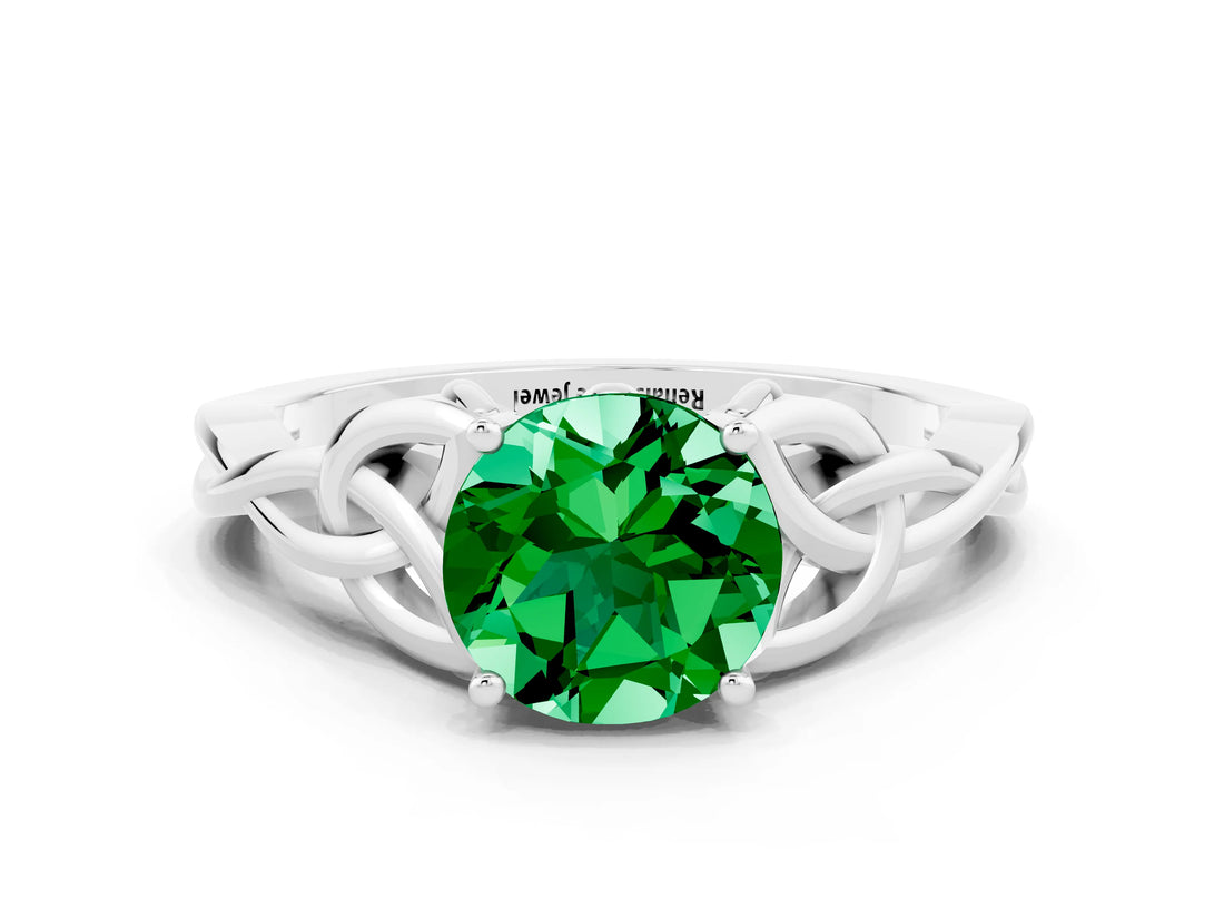White gold Round Cut Emerald Solitaire Engagement Ring with Celtic Knot Band and Four-Prong Setting