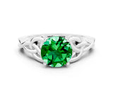 White gold Round Cut Emerald Solitaire Engagement Ring with Celtic Knot Band and Four-Prong Setting