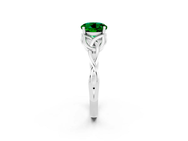 Platinum Round Cut Emerald Solitaire Engagement Ring with Celtic Knot Band and Four-Prong Setting