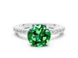 White gold Round Cut Emerald Solitaire Engagement Ring with Pavé Band and Four-Prong Setting