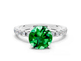 White gold Round Cut Emerald Solitaire Pavé Band with Four-Prong Setting