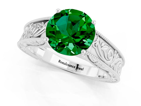 White gold Round Cut Emerald Solitaire Ring with Engraved Band and Four-Prong Setting_1