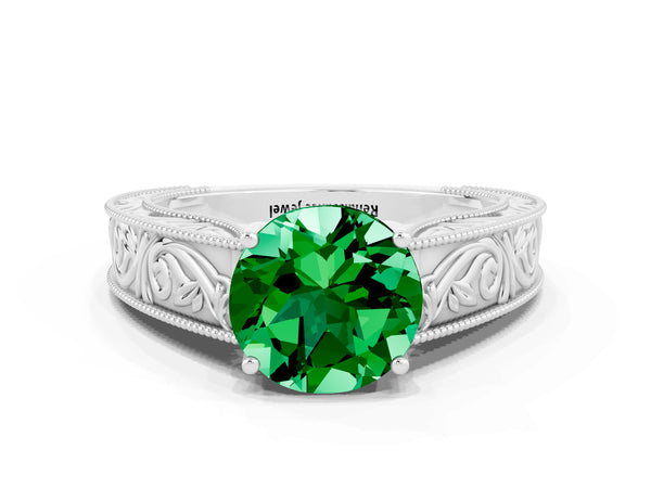 White gold Round Cut Emerald Solitaire Ring with Engraved Band and Four-Prong Setting