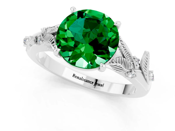 Silver Round Cut Emerald Solitaire Ring with Leaf Motif Band and Four-Prong Setting