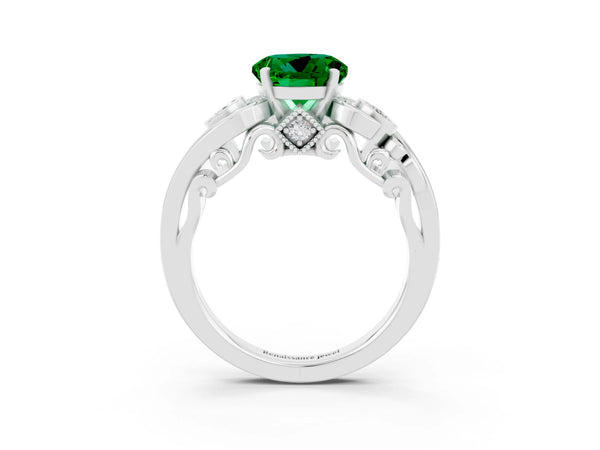 Platinum Round Cut Emerald Solitaire Ring with Milgrain Pavé Band and Four-Prong Setting