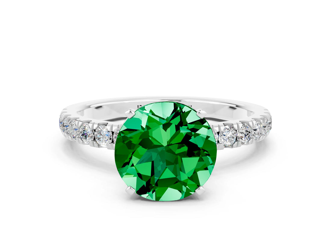 White gold Round Cut Emerald Solitaire Ring with Pavé Accents and Four-Prong Setting