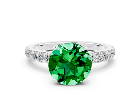White gold Round Cut Emerald Solitaire Ring with Pavé Accents and Four-Prong Setting