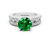 White gold Round Cut Emerald Solitaire Ring with Pavé and Channel Set Band
