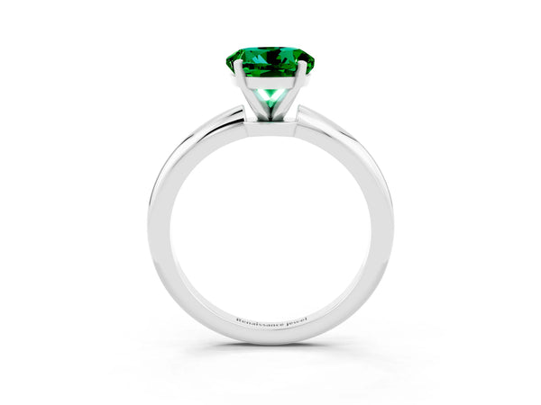 Silver Round Cut Emerald Solitaire Ring with Six-Prong Setting and Classic Band