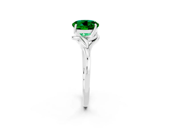Platinum Round Cut Emerald Solitaire Ring with Twist Band and Four-Prong Setting