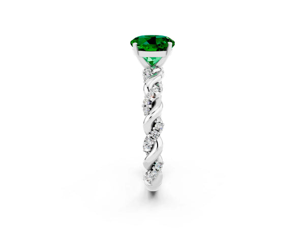 Platinum Round Cut Emerald Solitaire Ring with Twisted Band and Pavé Accents