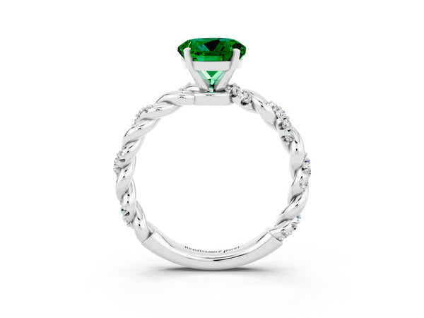 Platinum Round Cut Emerald Solitaire Ring with Twisted Band and Pavé Accents