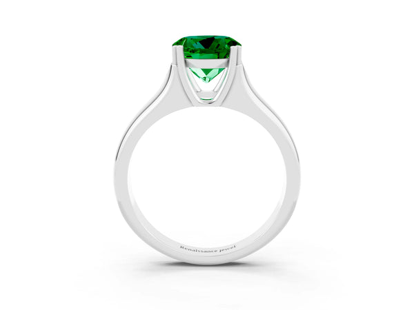 Silver Round Cut Emerald Solitaire Ring with Wide Band and Prong Setting
