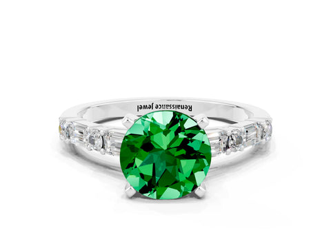 White gold Round Cut Emerald Solitaire with Side Baguettes and Channel Set Band