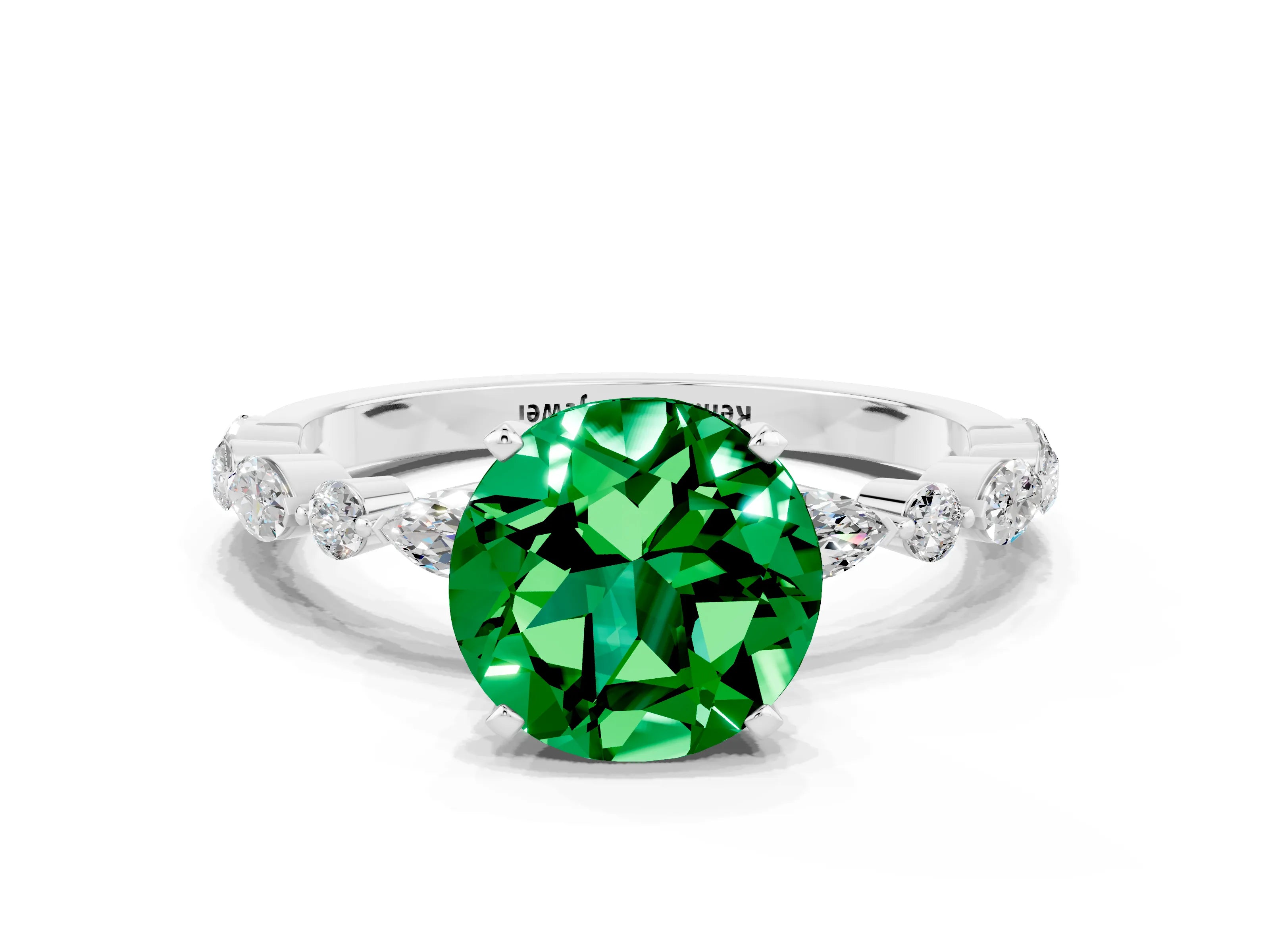 White gold Round Cut Emerald Solitaire with Side Stones on a Pavé Band and Four-Prong Setting