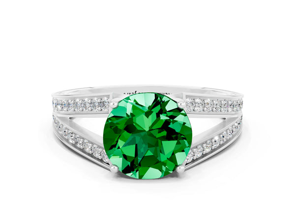 Platinum Round Cut Emerald Split Shank Ring with Pavé Band and Four-Prong Setting