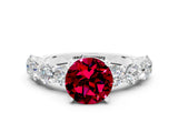 White gold Round Cut Garnet Prong Setting with Side Stones on a Pave Band