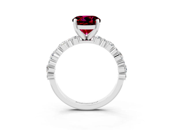 Platinum Round Cut Garnet Side Stone Solitaire Ring with Round  and Four-Prong Setting