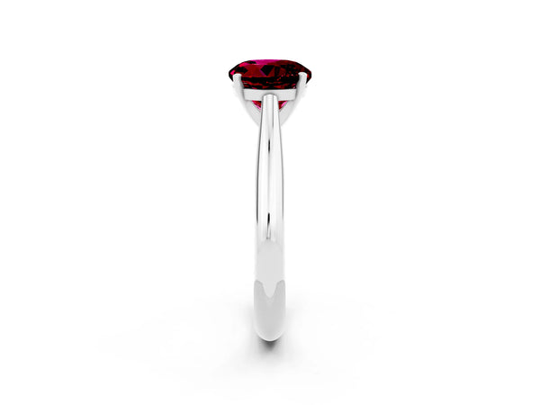 Platinum Round Cut Garnet Solitaire Engagement Ring with Cathedral Setting and Four-Prong Mount