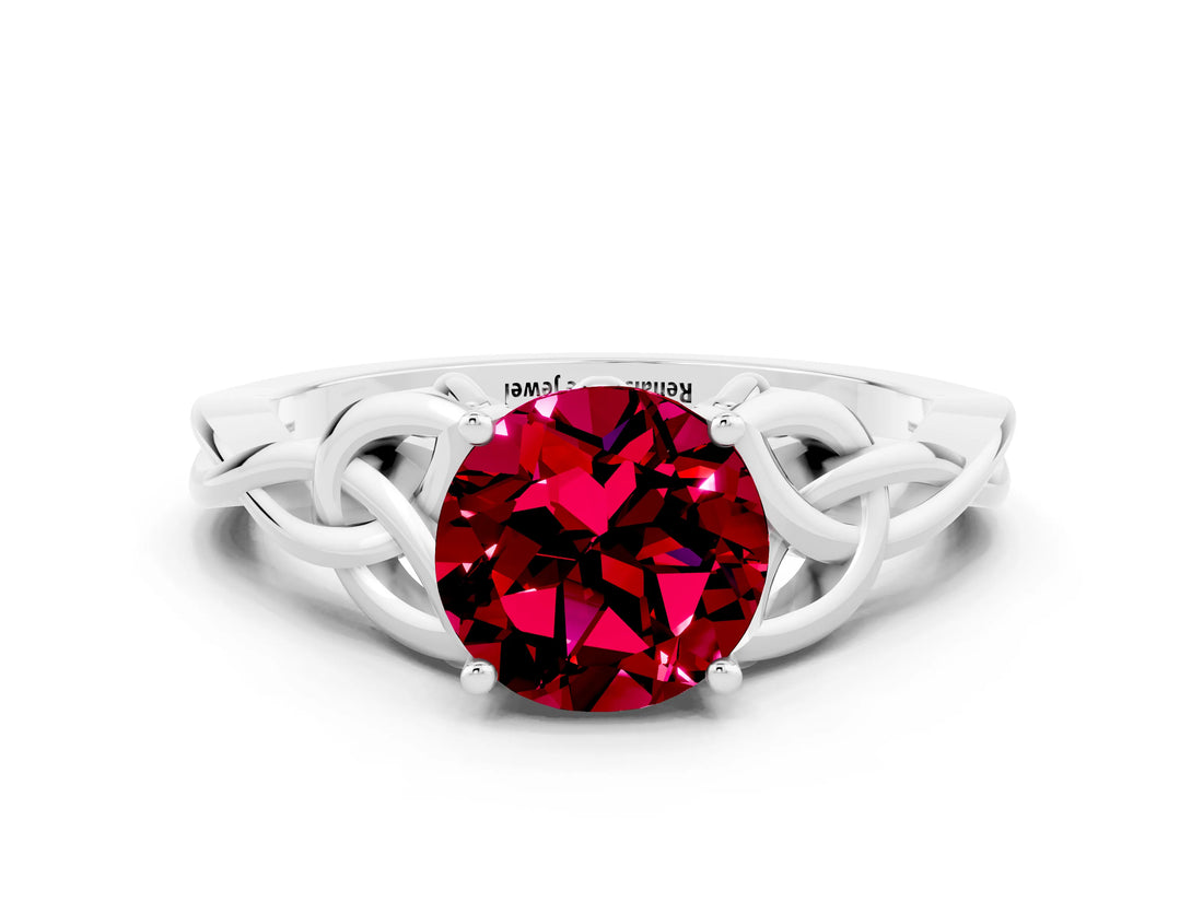 White gold Round Cut Garnet Solitaire Engagement Ring with Celtic Knot Band and Four-Prong Setting