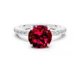 White gold Round Cut Garnet Solitaire Engagement Ring with Pavé Band and Four-Prong Setting