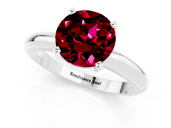 Platinum Round Cut Garnet Solitaire Engagement Ring with Round Band and Four-Prong Setting