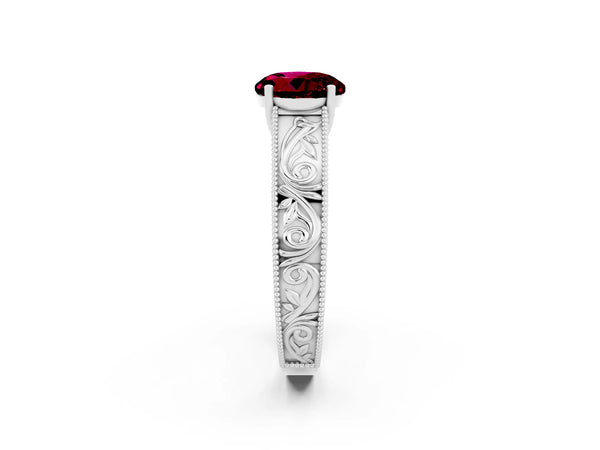 White gold Round Cut Garnet Solitaire Ring with Engraved Band and Four-Prong Setting