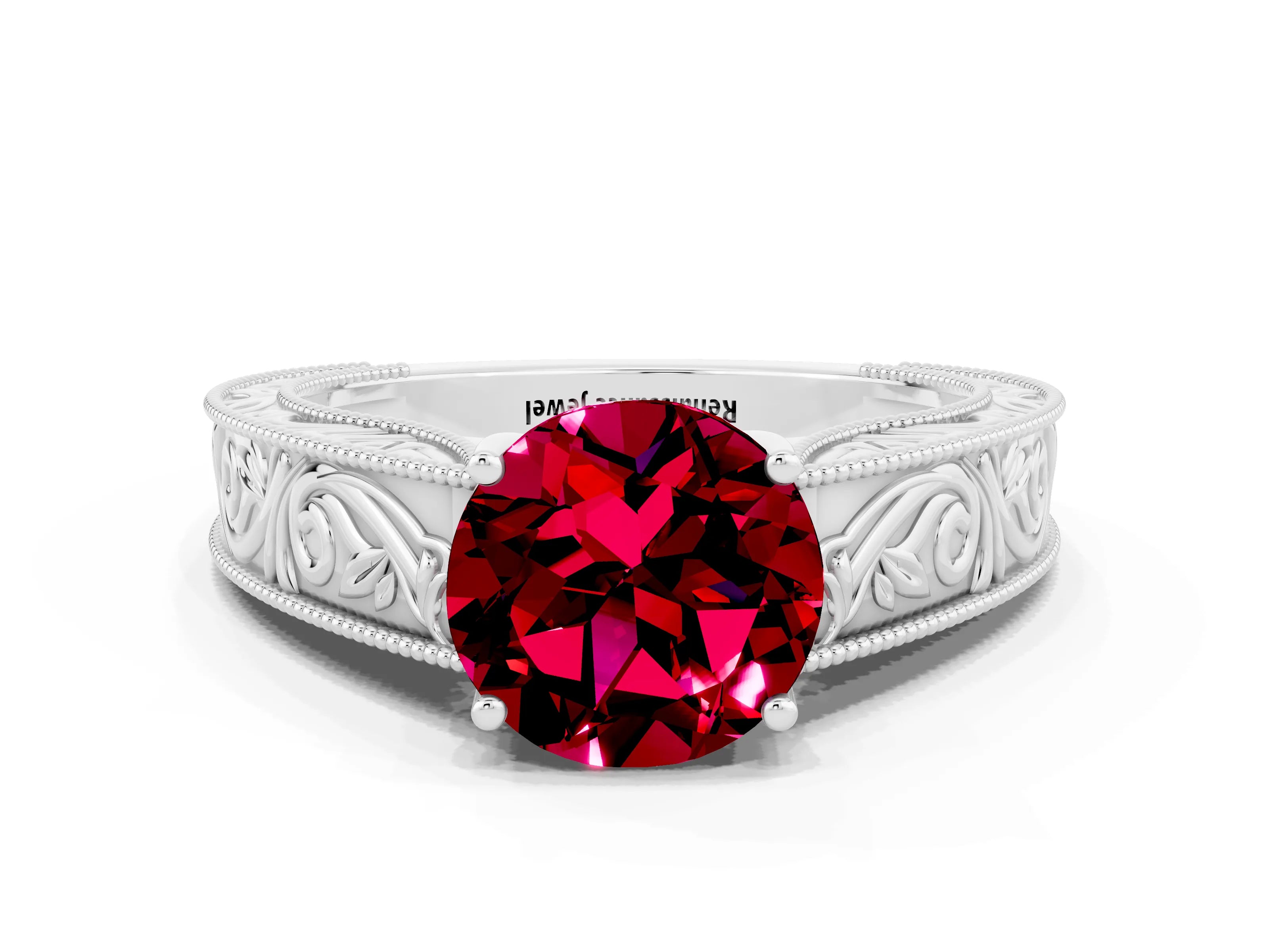 White gold Round Cut Garnet Solitaire Ring with Engraved Band and Four-Prong Setting