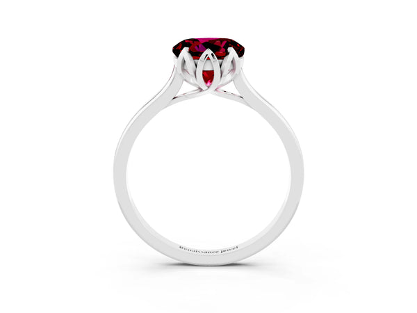 Silver Round Cut Garnet Solitaire Ring with Flower Prong Setting and Classic Band