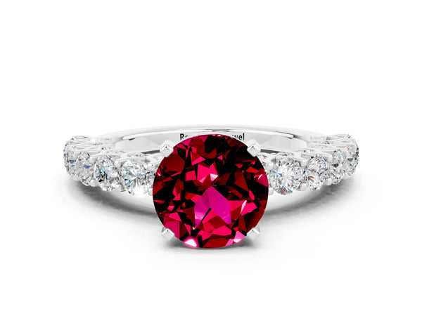 Silver Round Cut Garnet Solitaire Ring with Shared Prong Pavé Band and Four-Prong Setting