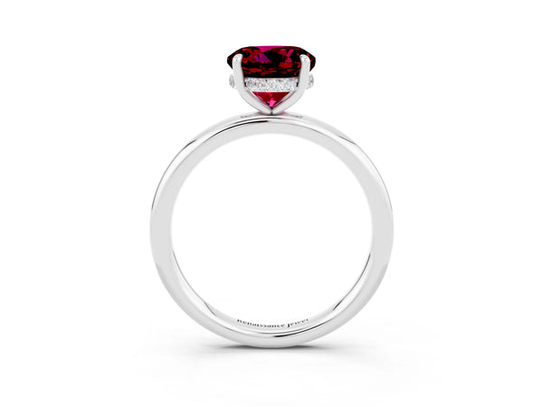 Silver Round Cut Garnet Solitaire Ring with Thin Band and Four-Prong Setting