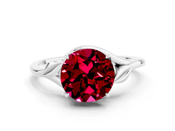 Platinum Round Cut Garnet Solitaire Ring with Twist Band and Four-Prong Setting