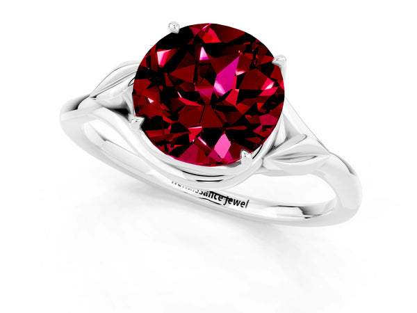 Silver Round Cut Garnet Solitaire Ring with Twist Band and Four-Prong Setting