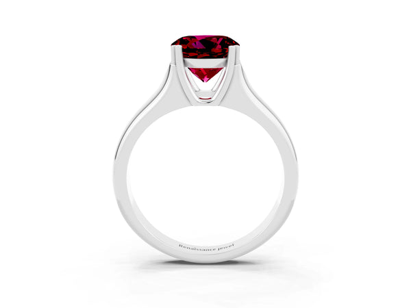 Platinum Round Cut Garnet Solitaire Ring with Wide Band and Prong Setting