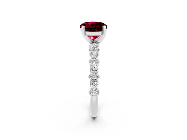 Platinum Round Cut Garnet Side Stone Solitaire Ring with Round  and Four-Prong Setting