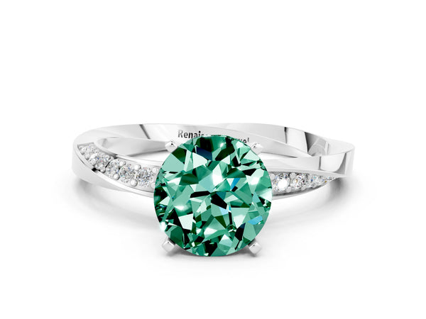 Silver Round Cut Green Sapphire Engagement Ring with Side Stone Accents and Four-Prong Setting