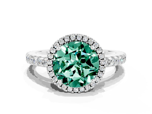 Platinum Round Cut Green Sapphire Halo Engagement Ring with Pavé Band and Prong Setting