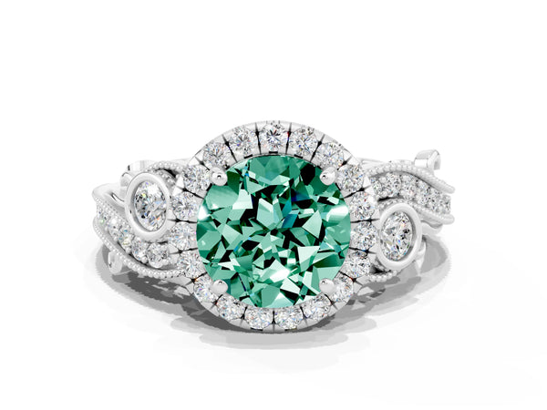 Platinum Round Cut Green Sapphire Halo Ring with Milgrain Pavé Band and Four-Prong Setting