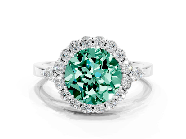 Platinum Round Cut Green Sapphire Halo Ring with Pear Side Stones and Prong Setting