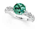 White gold Round Cut Green Sapphire Prong Setting with Side Stones on a Pave Band_1