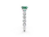 White gold Round Cut Green Sapphire Prong Setting with Side Stones on a Pave Band_2
